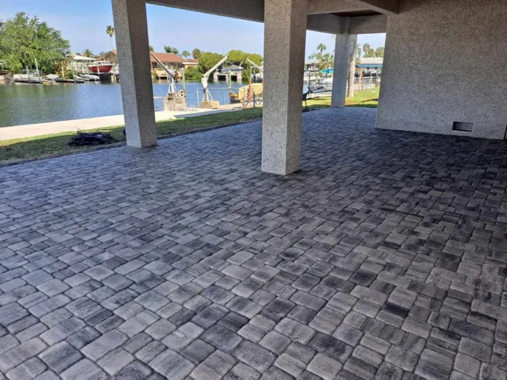 large paver job under lower level of home